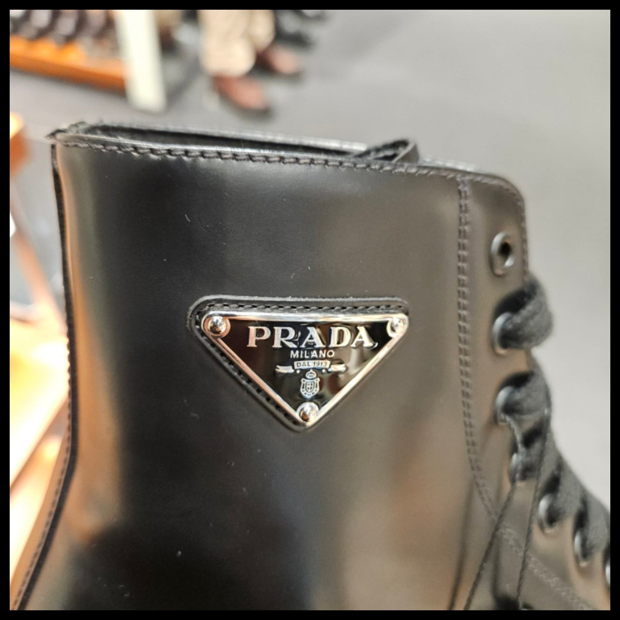 【PRADA】Men’s triangle-logo brushed leather boots black