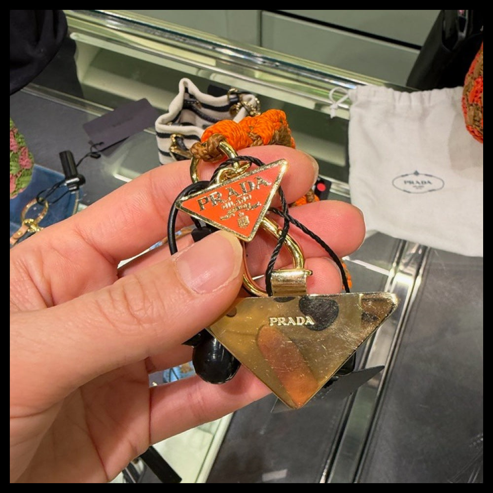 【Prada】Triangle Logo Crochet Flower Strap Keyring Orange