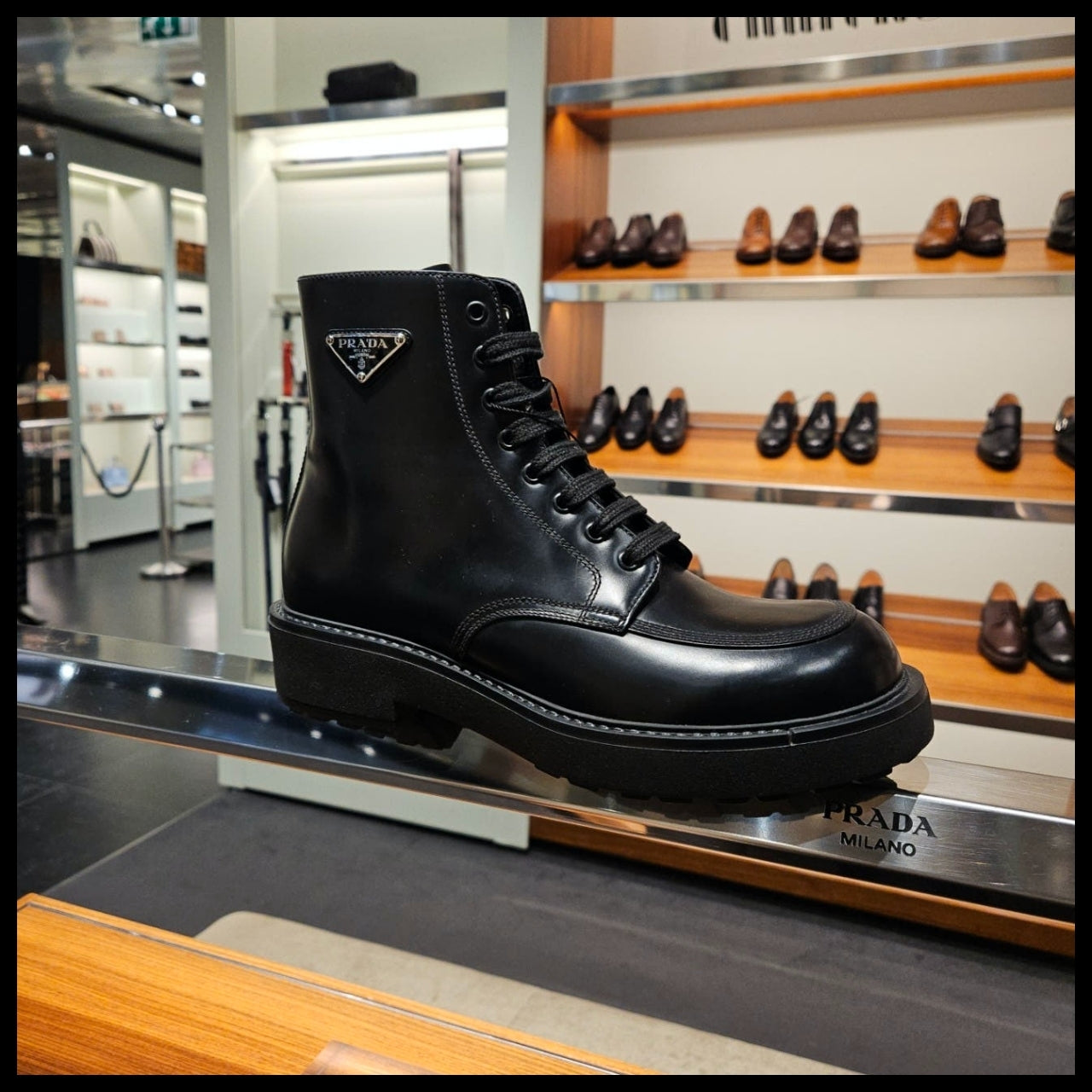 【PRADA】Men’s triangle-logo brushed leather boots black