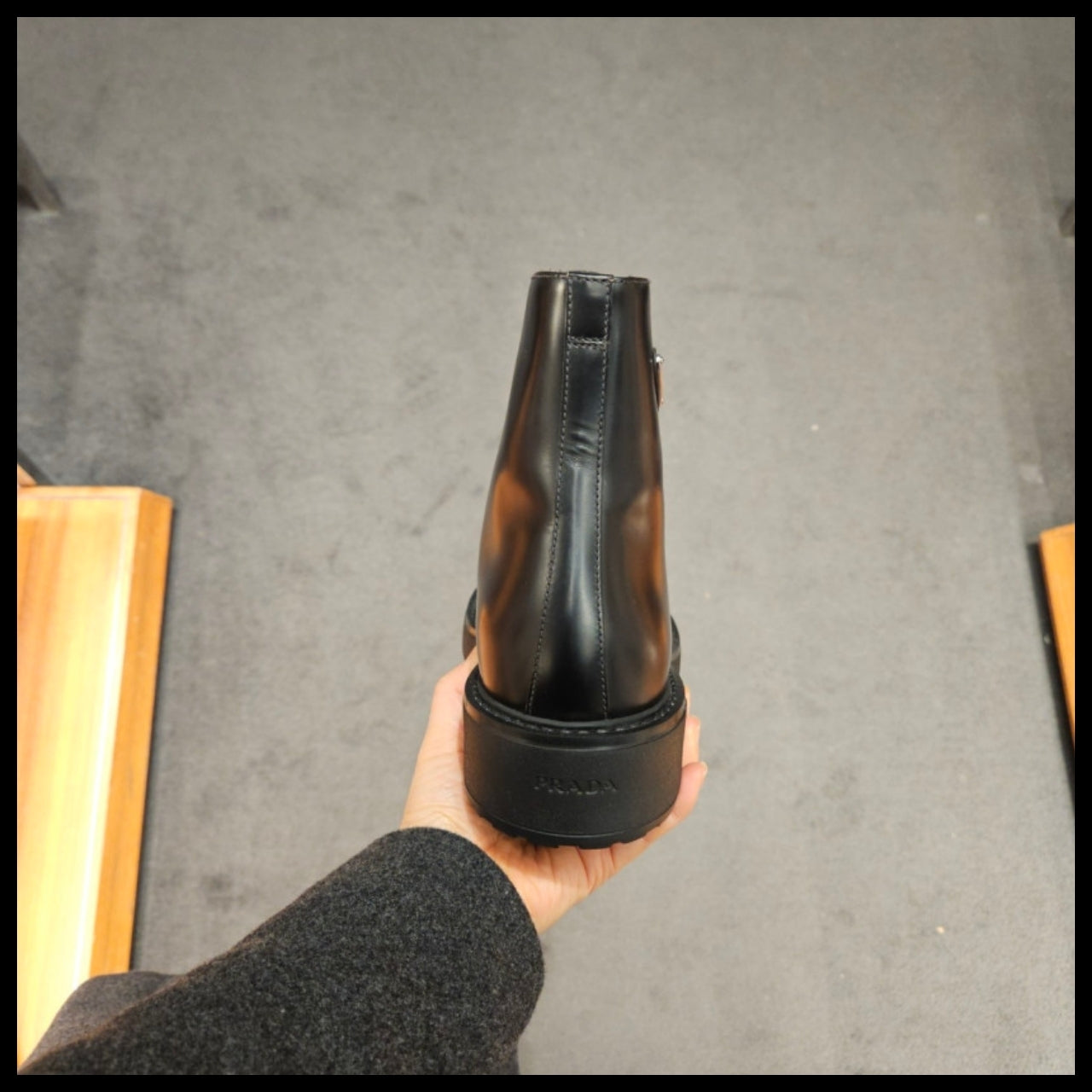 【PRADA】Men’s triangle-logo brushed leather boots black