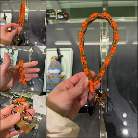 【Prada】Triangle Logo Crochet Flower Strap Keyring Orange