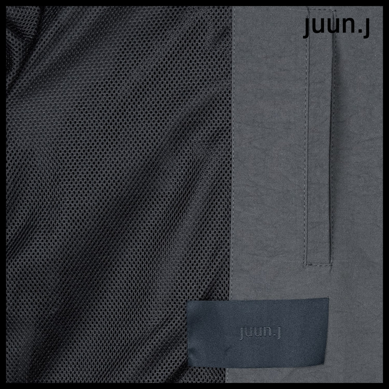 【JUUN.J】Curved Cut Design Stand Collar Jumper Grey